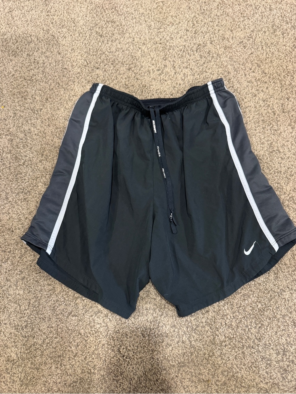 Nike Women’s Black Athletic Shorts with White and Gray Side Piping